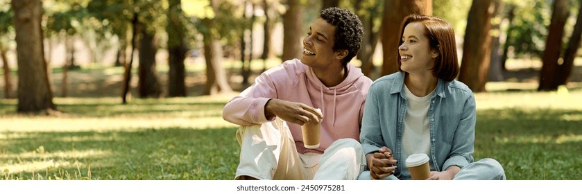 Diverse couple in vibrant attire enjoying a peaceful moment together as they sit on the lush green grass in a park. - Powered by Shutterstock