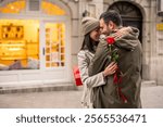 A diverse couple, wearing cozy winter attire, shares a heartfelt embrace on a city street. The scene reflects gratitude and connection, enhancing the romantic atmosphere.