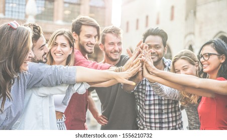 Diverse Culture Students Stacking Hands Outdoor - Young Happy People Celebrating Together - Youth, Lifestyle, University, Relationship, Human Resources, Work And Friendship Concept - Focus On Hands