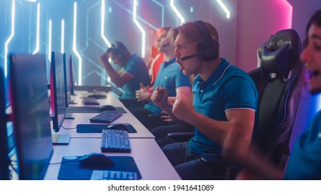 Diverse Esport Team of Pro Gamers Play in Computer Video Game and Win Championship, Celebrate with YES Gestures. Stylish Design Cyber Games Arena. Online Streaming of Tournament. Side View