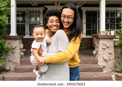 Diverse Family Standing In Front Of The House During Covid19 Lockdown