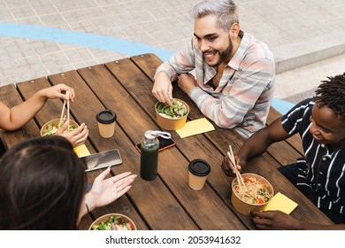 Diverse Friends Eating Take Away Food Outdoor - Real People, Millennial Lifestyle - Focus On Queer Man