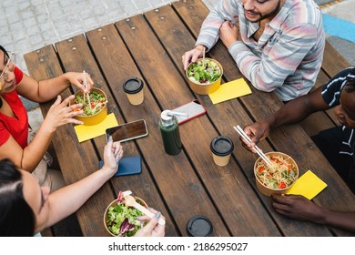 Diverse Friends Eating Take Away Food Outdoor - Soft Focus On Caucasian Man Face