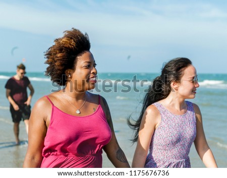 Diverse friends having fun at the beach