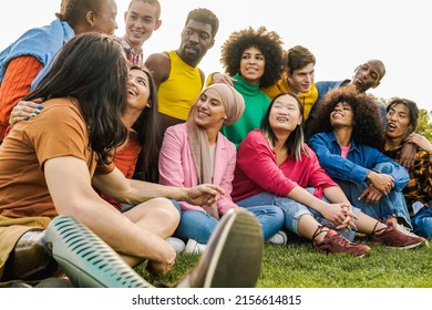 Diverse friends having fun outdoor during summer vacations - Focus on muslim girl face - Diversity and multiethnic community concept - Powered by Shutterstock