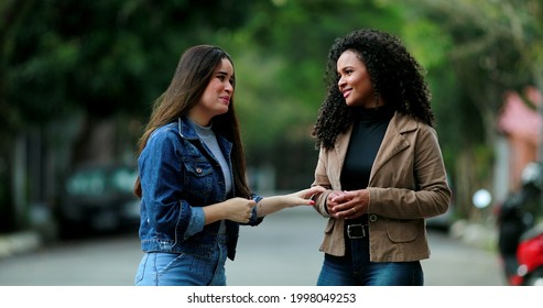 Diverse Friendship, Two Women Talking Outside At Park