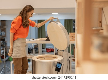 A diverse group of adults engaged in a fun pottery crafting session. - Powered by Shutterstock