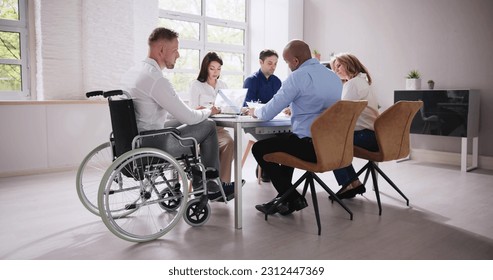 Diverse Group Of Business People Meeting At Workplace - Powered by Shutterstock