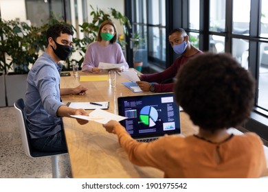 Diverse Group Of Business People Working In Creative Office. Group Of People In A Meeting Discussing Work. Social Distancing Protection Hygiene In Workplace During Covid 19 Pandemic.