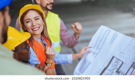 A diverse group of construction workers enthusiastically examining blueprints at a job site. They wear safety vests and helmets, showcasing teamwork and determination in the engineering field. - Powered by Shutterstock