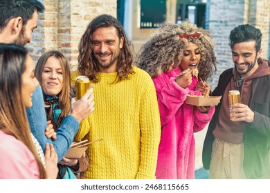 A diverse group of friends enjoying street food and drinks together outdoors. The image captures a social gathering, fun, and the joy of sharing a meal with friends. - Powered by Shutterstock