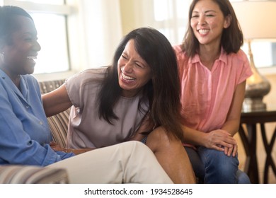 Diverse Group Of Friends Laughing And Talking.