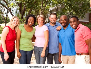 Diverse group of friends. Multicultural people smiling. Friends smiling and laughing. - Shutterstock ID 496965490