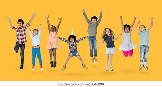 Diverse Group Of Kids Jumping And Having Fun