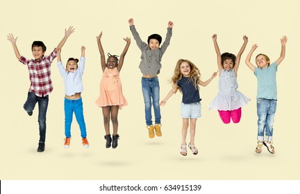 Diverse Group Of Kids Jumping And Having Fun