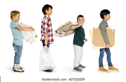 Diverse Group Of Kids Recycling Garbage