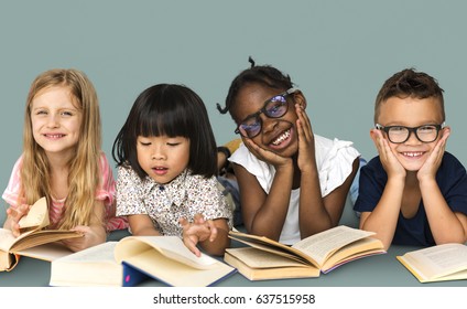 Diverse Group Of Kids Study Read Book