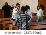 Diverse group of people celebrating their faith in a beautiful church, singing songs of praise and praying together, united in spirituality and love for god and jesus