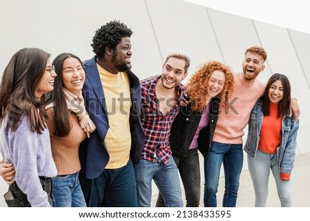 Diverse group of people having fun together outdoor - Friends and diversity lifestyle concept - Focus on gay man wearing makeup