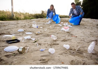 Diverse Group Of People Picking Up Trash In The Park Volunteer Community Service