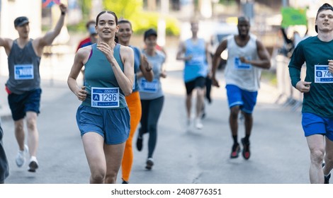 Diverse Group of People Running a Marathon in a City During the Day. Active and Fit Smiling Female Runner Competing to Reach the Finish Line, Supported by Friends and Family - Powered by Shutterstock