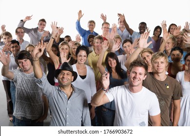 Diverse Group Of People Standing Together And Waving