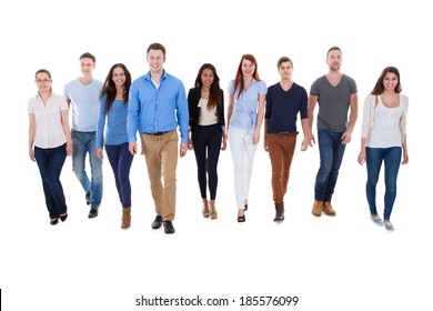 Diverse Group Of People Walking Towards Camera. Isolated On White