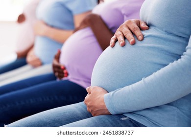 diverse group of pregnant women in black - Powered by Shutterstock