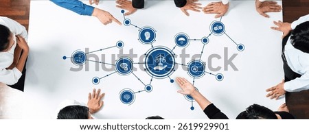 A diverse group of professionals engaged in a collaborative discussion surrounding ethics and justice principles in a business setting, analyzing key concepts and decisions. Amity