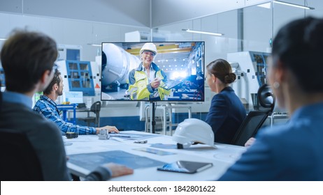 Diverse Group Of Specialists, Managers In The Factory Office Meeting Room, Have Conference Video Call With Factory Chief Female Engineer, She Talks About Production Growth, Uses Tablet Computer