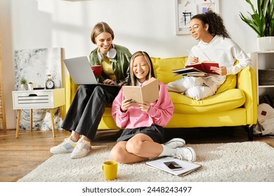 A diverse group of teenage girls sit closely together on a vibrant yellow couch, engrossed in studying and deep in conversation. - Powered by Shutterstock