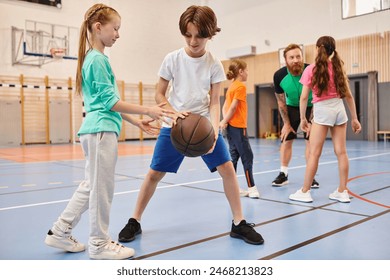 A diverse group of young children playing basketball with enthusiasm and energy in a vibrant setting. - Powered by Shutterstock