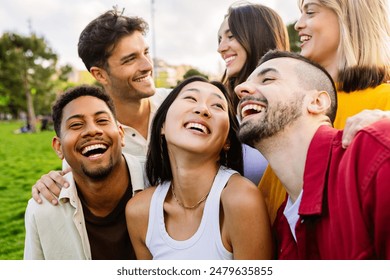 Diverse group of young friends having fun together outdoors in summer. Millennial student people laughing walking in city street enjoying holiday. Youth community and friendship concept. - Powered by Shutterstock