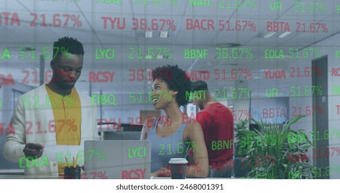 A diverse group of young professionals collaborating on project, one showing something on a laptop. Office environment with stock market data overlayed, indicating a financial or tech setting - Powered by Shutterstock