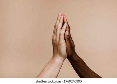 Diverse Hands Giving High Five