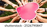 Diverse hands holding pink heart. Many diverse hands hold heart together. Unity and love. Diverse men and women holding a heart together. charity, support and volunteering. Group of people with heart