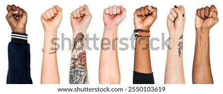 Diverse hands raised in unity. Different skin tones, tattoos, and accessories. Unity and diversity. Raised fists symbolizing strength and solidarity. Isolated on white background. Arms raised.