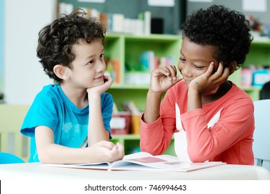 Diverse Kid At Kindergarten School, American And African Boys Are Studying Together With Happiness In Their Classroom, Preschool Education Concept