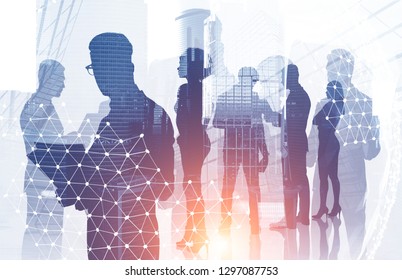 Diverse manager team members silhouettes over modern cityscape background with double exposure of planet hologram. International company concept. Toned image