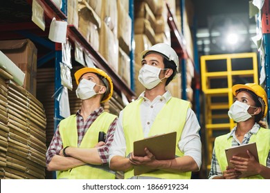 Diverse multiethnic group of warehouse worker ware face mask working in cargo. concept of diversity people and new normal working lifestyle after Covid 19 coronavirus pandemic - Shutterstock ID 1866919234