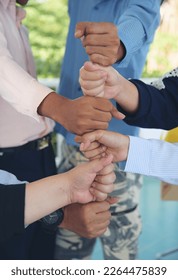 Diverse multiethnic Partners hands together teamwork group of multiracial people meeting join hands togetherness. Diversity people hands join empower partnership teams connection volunteer community - Shutterstock ID 2264475839