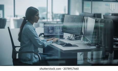 Diverse Office: Indian IT Programmer Working On Desktop Computer. Female Specialist Creating Innovative Software. Engineer Developing App, Program, Video Game. Writing Code.