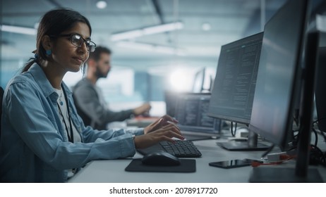 Diverse Office: Indian IT Programmer Working on Desktop Computer. Female Specialist Creating Innovative Software. Engineer Developing App, Program, Video Game. Writing Code in Terminal. - Shutterstock ID 2078917720