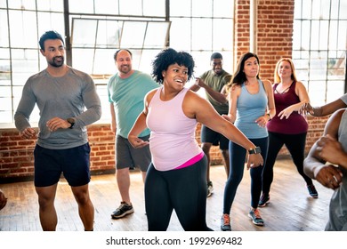 Diverse People In An Active Dance Class