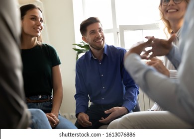Diverse people attending at group therapy session listening psychologist counsellor, sharing personal stories, supporting overcome struggle with addiction together, psychotherapy meeting rehab concept - Shutterstock ID 1613076886