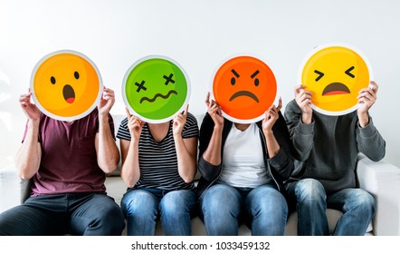 Diverse People Holding Emoticon