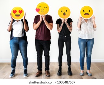 Diverse People Holding Emoticon