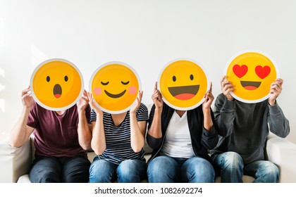 Diverse People Holding Emoticon