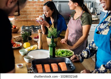 Diverse people joining cooking class - Powered by Shutterstock