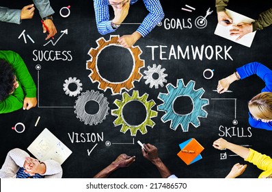 Diverse People in a Meeting and Teamwork Concept - Shutterstock ID 217486570
